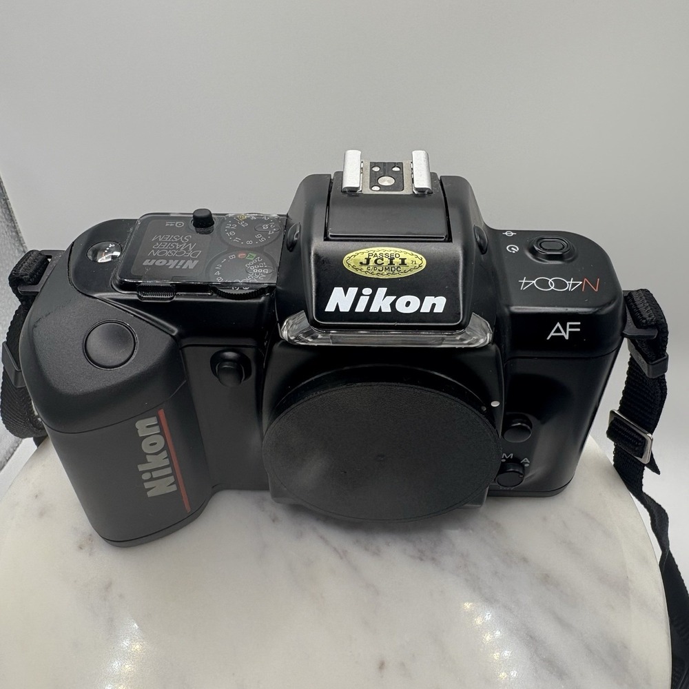 Vintage Nikon N4004 AF 35mm SLR Film Camera Body Only W/ Manuals Bag Powers On - Picture 2 of 14